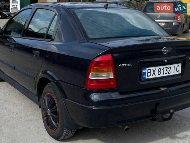 Черный Опель Астра, объемом двигателя 1.4 л и пробегом 270 тыс. км за 3000 $, фото 2 на Automoto.ua