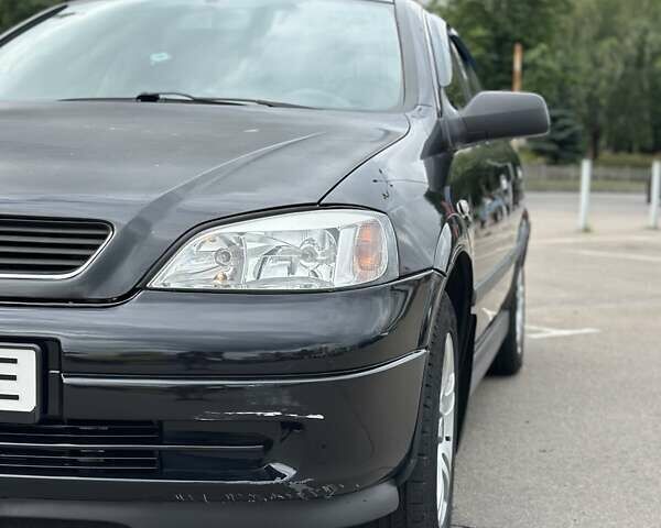 Черный Опель Астра, объемом двигателя 1.4 л и пробегом 277 тыс. км за 3300 $, фото 10 на Automoto.ua