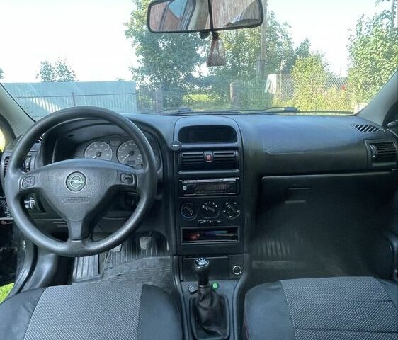 Черный Опель Астра, объемом двигателя 1.4 л и пробегом 278 тыс. км за 2699 $, фото 8 на Automoto.ua