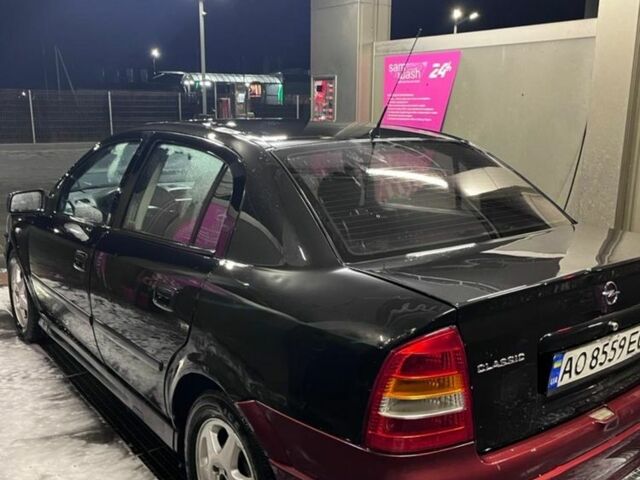 Черный Опель Астра, объемом двигателя 1.4 л и пробегом 338 тыс. км за 2300 $, фото 3 на Automoto.ua