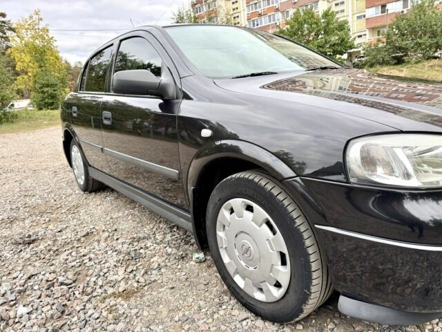 Черный Опель Астра, объемом двигателя 1.4 л и пробегом 176 тыс. км за 4390 $, фото 8 на Automoto.ua