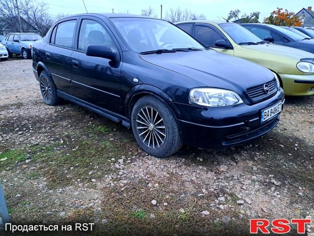 Черный Опель Астра, объемом двигателя 1.4 л и пробегом 256 тыс. км за 2150 $, фото 3 на Automoto.ua