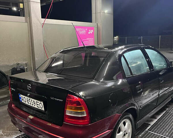 Чорний Опель Астра, об'ємом двигуна 1.4 л та пробігом 338 тис. км за 2300 $, фото 4 на Automoto.ua