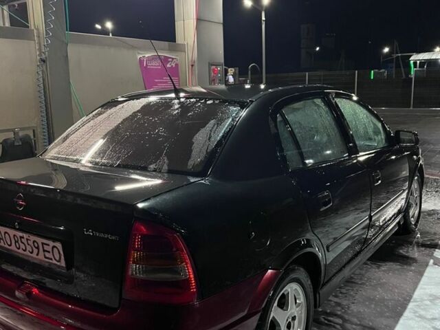 Черный Опель Астра, объемом двигателя 1.4 л и пробегом 338 тыс. км за 2300 $, фото 10 на Automoto.ua