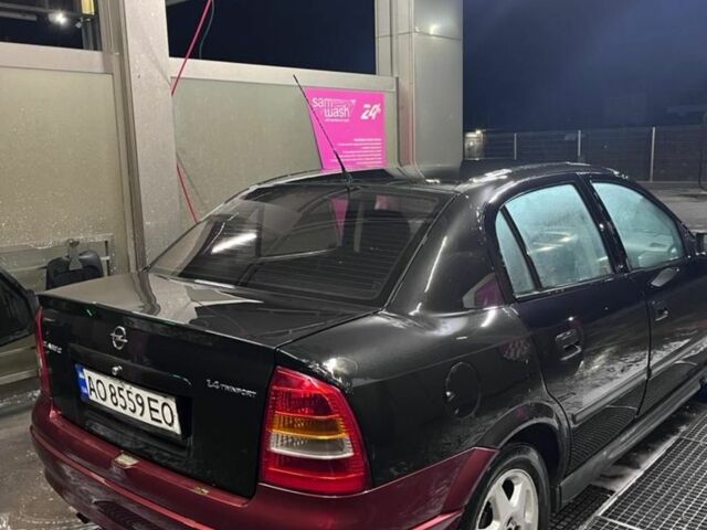 Черный Опель Астра, объемом двигателя 1.4 л и пробегом 338 тыс. км за 2300 $, фото 4 на Automoto.ua