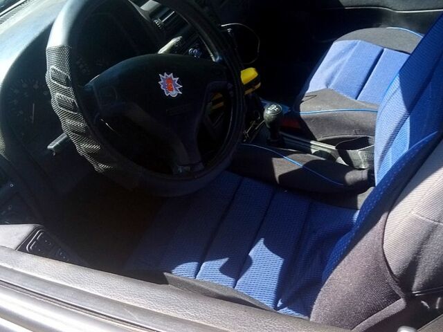 Черный Опель Астра, объемом двигателя 1.4 л и пробегом 100 тыс. км за 3300 $, фото 1 на Automoto.ua