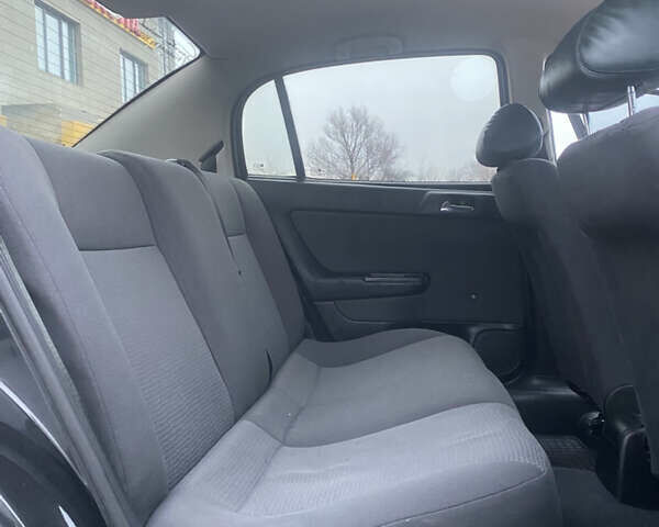 Черный Опель Астра, объемом двигателя 1.4 л и пробегом 229 тыс. км за 3200 $, фото 14 на Automoto.ua