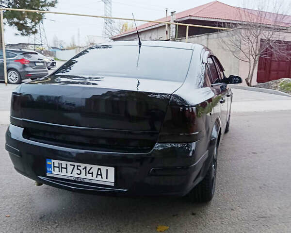 Черный Опель Астра, объемом двигателя 1.8 л и пробегом 212 тыс. км за 4999 $, фото 7 на Automoto.ua