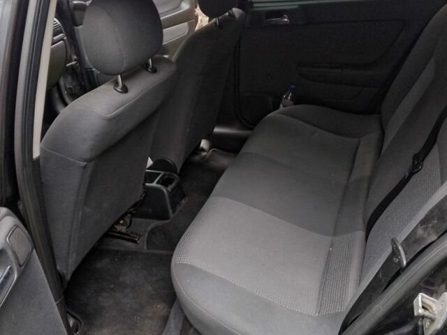 Черный Опель Астра, объемом двигателя 1.6 л и пробегом 2 тыс. км за 2000 $, фото 7 на Automoto.ua