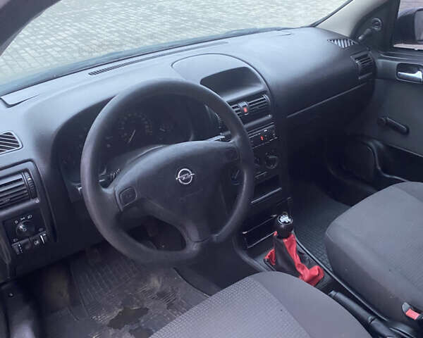 Черный Опель Астра, объемом двигателя 1.4 л и пробегом 229 тыс. км за 3200 $, фото 11 на Automoto.ua