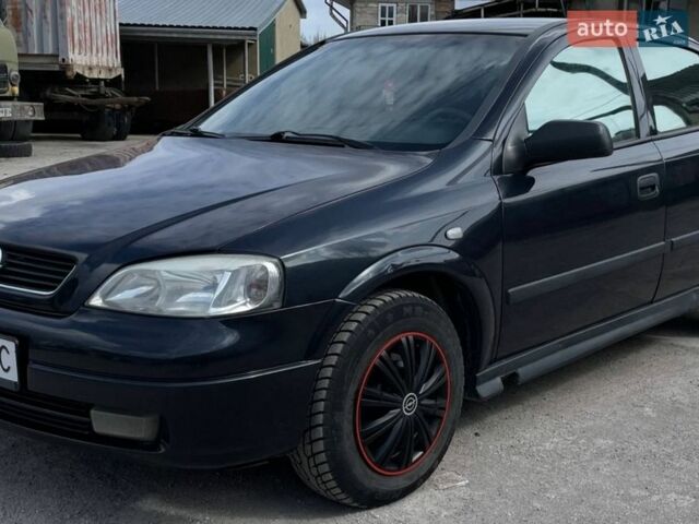 Черный Опель Астра, объемом двигателя 1.4 л и пробегом 270 тыс. км за 3000 $, фото 9 на Automoto.ua