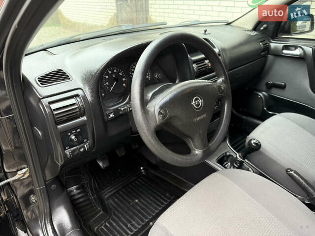 Чорний Опель Астра, об'ємом двигуна 1.4 л та пробігом 160 тис. км за 4000 $, фото 11 на Automoto.ua
