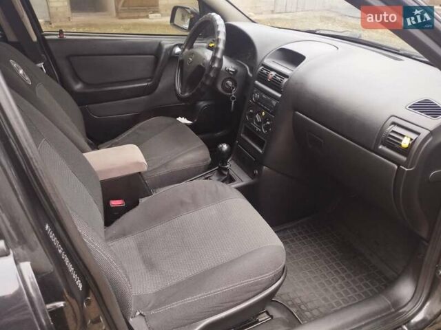 Чорний Опель Астра, об'ємом двигуна 1.4 л та пробігом 250 тис. км за 3999 $, фото 9 на Automoto.ua