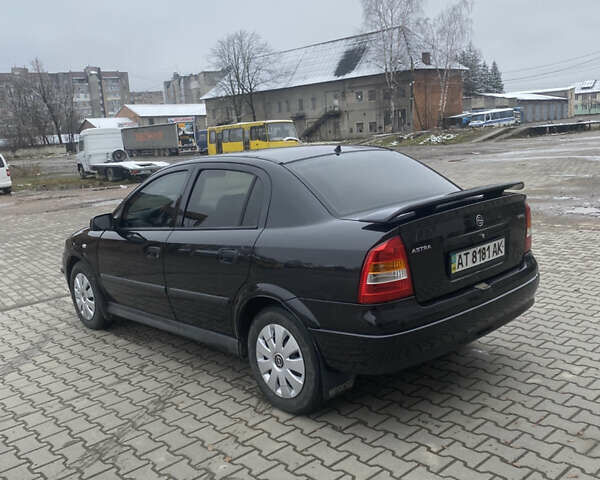 Черный Опель Астра, объемом двигателя 1.4 л и пробегом 229 тыс. км за 3200 $, фото 5 на Automoto.ua