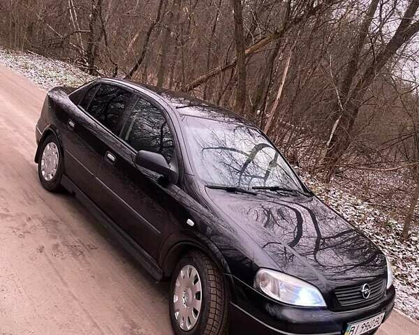 Черный Опель Астра, объемом двигателя 1.4 л и пробегом 160 тыс. км за 3500 $, фото 5 на Automoto.ua