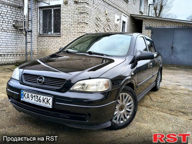 Черный Опель Астра, объемом двигателя 1.4 л и пробегом 250 тыс. км за 3999 $, фото 1 на Automoto.ua