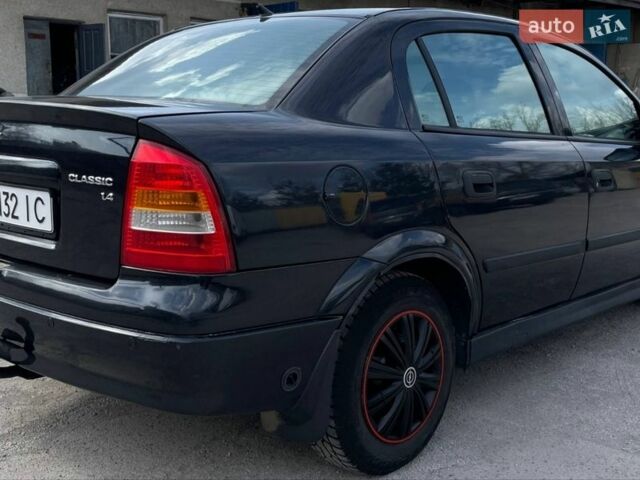 Черный Опель Астра, объемом двигателя 1.4 л и пробегом 270 тыс. км за 3000 $, фото 3 на Automoto.ua