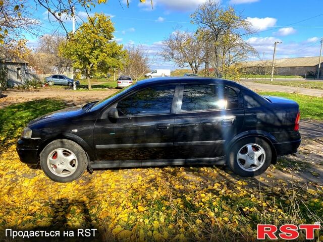 Черный Опель Астра, объемом двигателя 1.4 л и пробегом 168 тыс. км за 2450 $, фото 3 на Automoto.ua