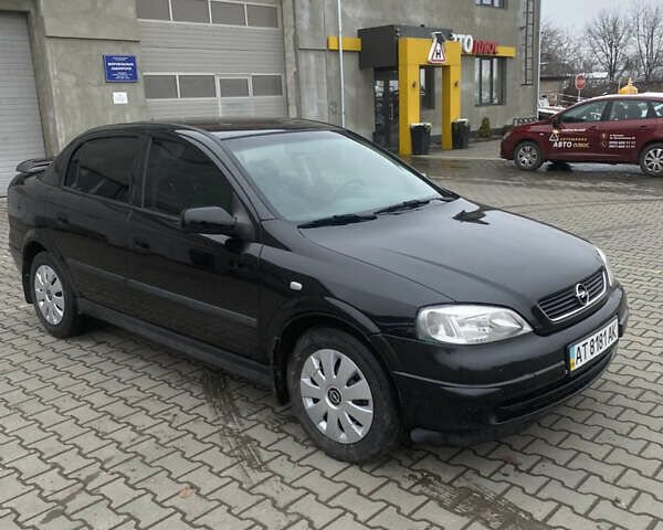 Черный Опель Астра, объемом двигателя 1.4 л и пробегом 229 тыс. км за 3200 $, фото 2 на Automoto.ua