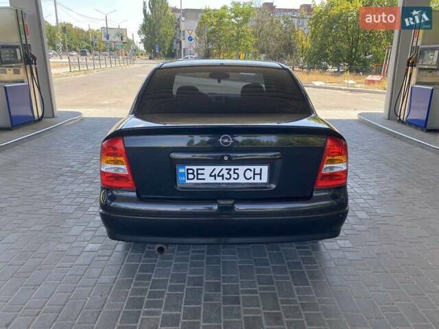 Черный Опель Астра, объемом двигателя 1.4 л и пробегом 107 тыс. км за 4800 $, фото 7 на Automoto.ua