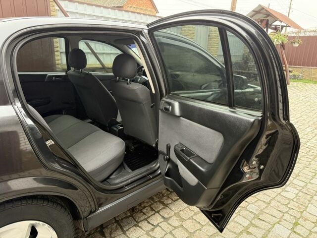 Черный Опель Астра, объемом двигателя 1.4 л и пробегом 160 тыс. км за 4000 $, фото 12 на Automoto.ua