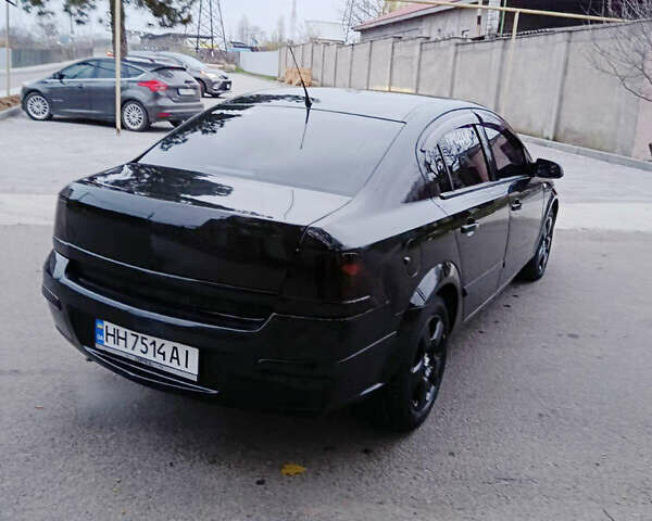 Черный Опель Астра, объемом двигателя 1.8 л и пробегом 212 тыс. км за 4999 $, фото 6 на Automoto.ua