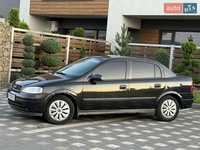 Чорний Опель Астра, об'ємом двигуна 1.6 л та пробігом 214 тис. км за 2999 $, фото 12 на Automoto.ua