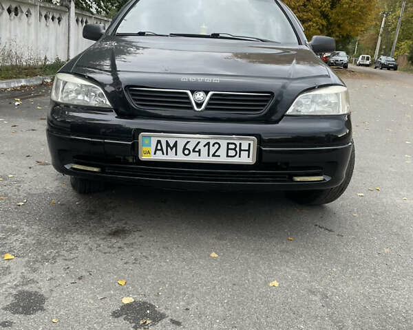 Черный Опель Астра, объемом двигателя 1.6 л и пробегом 150 тыс. км за 3800 $, фото 2 на Automoto.ua
