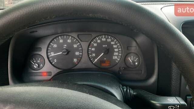 Черный Опель Астра, объемом двигателя 1.36 л и пробегом 158 тыс. км за 4000 $, фото 6 на Automoto.ua