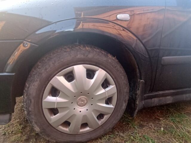 Черный Опель Астра, объемом двигателя 1.4 л и пробегом 129 тыс. км за 3700 $, фото 10 на Automoto.ua