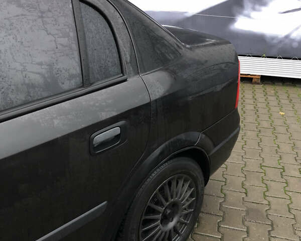 Черный Опель Астра, объемом двигателя 1.36 л и пробегом 292 тыс. км за 2700 $, фото 4 на Automoto.ua