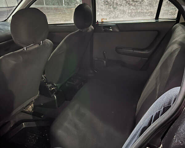 Чорний Опель Астра, об'ємом двигуна 1.4 л та пробігом 338 тис. км за 2300 $, фото 8 на Automoto.ua