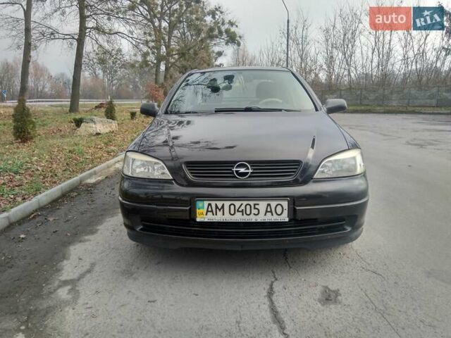 Черный Опель Астра, объемом двигателя 1.6 л и пробегом 198 тыс. км за 4100 $, фото 11 на Automoto.ua