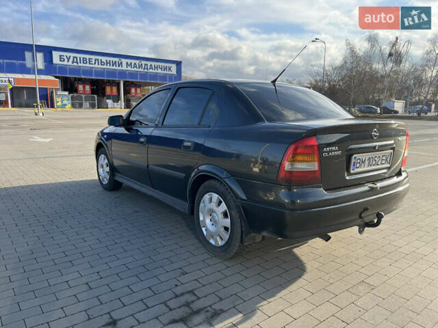 Черный Опель Астра, объемом двигателя 1.36 л и пробегом 178 тыс. км за 4000 $, фото 3 на Automoto.ua