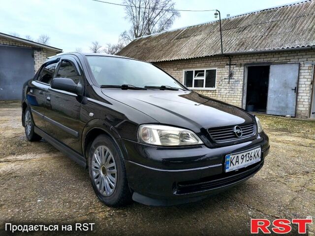 Черный Опель Астра, объемом двигателя 1.4 л и пробегом 250 тыс. км за 3999 $, фото 2 на Automoto.ua