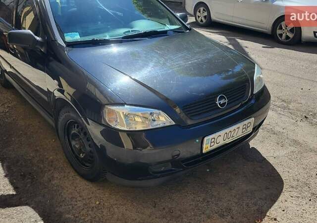 Черный Опель Астра, объемом двигателя 1.6 л и пробегом 122 тыс. км за 5700 $, фото 1 на Automoto.ua