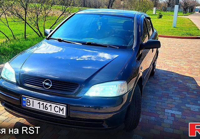 Чорний Опель Астра, об'ємом двигуна 1.6 л та пробігом 260 тис. км за 4150 $, фото 6 на Automoto.ua