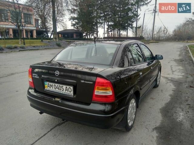 Черный Опель Астра, объемом двигателя 1.6 л и пробегом 198 тыс. км за 4100 $, фото 3 на Automoto.ua