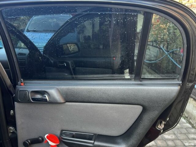 Черный Опель Астра, объемом двигателя 1.6 л и пробегом 151 тыс. км за 3700 $, фото 12 на Automoto.ua