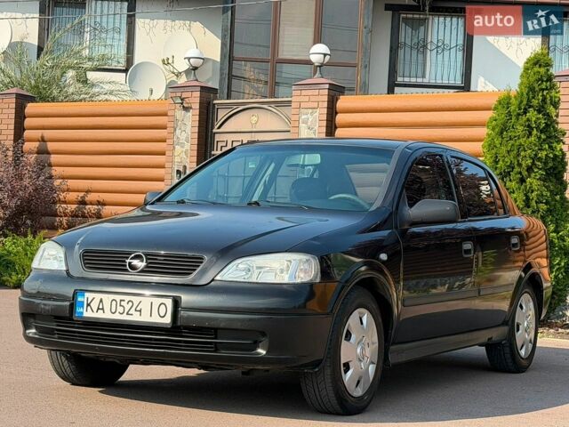 Черный Опель Астра, объемом двигателя 1.36 л и пробегом 200 тыс. км за 3700 $, фото 2 на Automoto.ua
