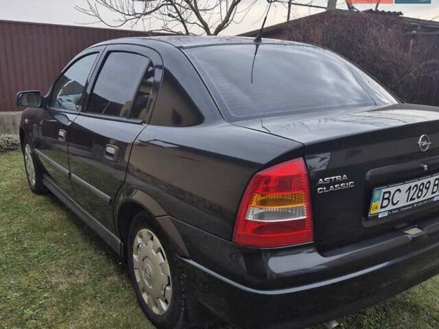 Черный Опель Астра, объемом двигателя 1.4 л и пробегом 160 тыс. км за 4300 $, фото 3 на Automoto.ua