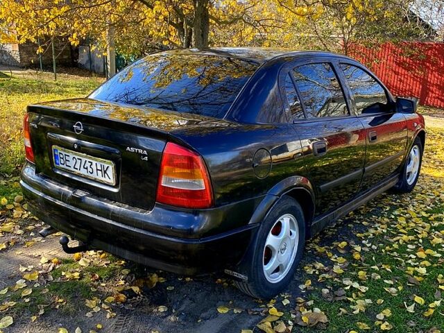 Черный Опель Астра, объемом двигателя 1.4 л и пробегом 168 тыс. км за 2450 $, фото 6 на Automoto.ua