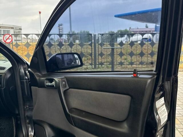 Черный Опель Астра, объемом двигателя 1.8 л и пробегом 185 тыс. км за 4100 $, фото 5 на Automoto.ua
