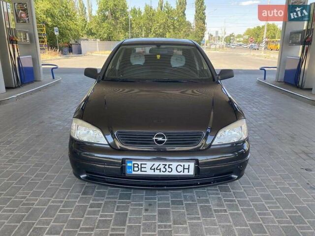 Черный Опель Астра, объемом двигателя 1.4 л и пробегом 107 тыс. км за 4800 $, фото 1 на Automoto.ua