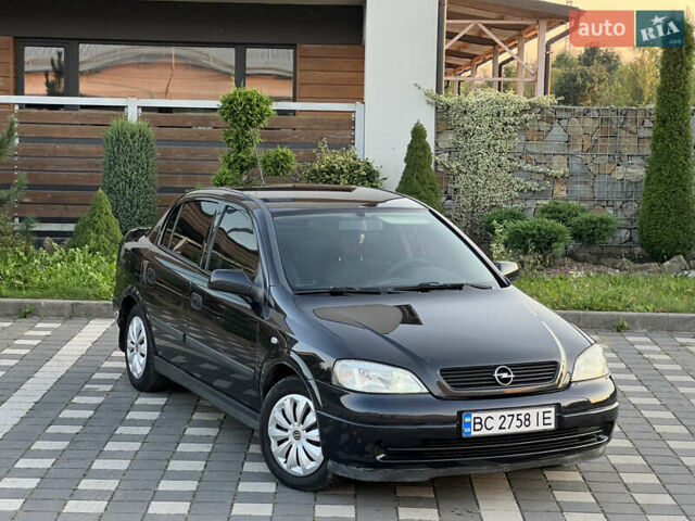 Чорний Опель Астра, об'ємом двигуна 1.6 л та пробігом 214 тис. км за 2999 $, фото 1 на Automoto.ua