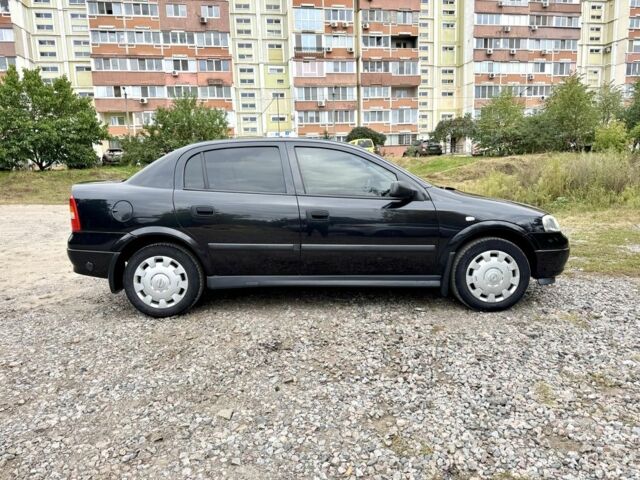 Черный Опель Астра, объемом двигателя 1.4 л и пробегом 176 тыс. км за 4390 $, фото 7 на Automoto.ua