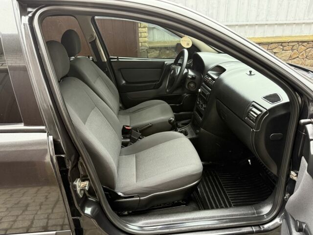 Черный Опель Астра, объемом двигателя 1.4 л и пробегом 160 тыс. км за 4000 $, фото 14 на Automoto.ua