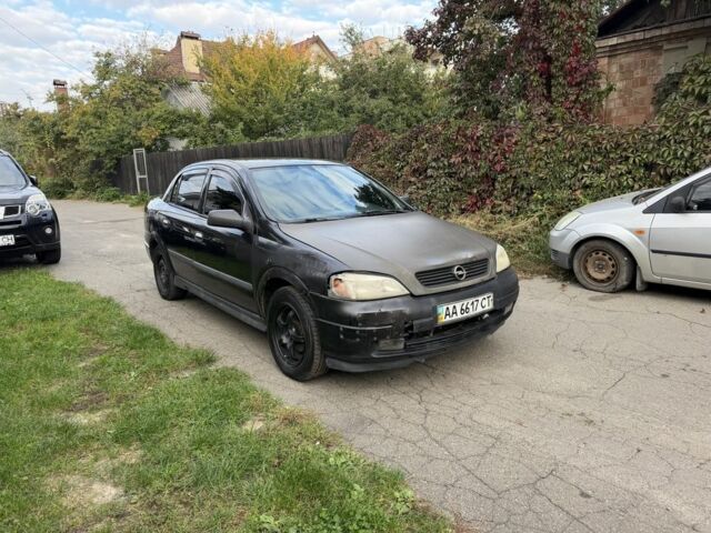 Черный Опель Астра, объемом двигателя 1.4 л и пробегом 240 тыс. км за 1554 $, фото 2 на Automoto.ua