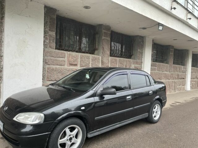 Черный Опель Астра, объемом двигателя 1.6 л и пробегом 240 тыс. км за 4500 $, фото 2 на Automoto.ua