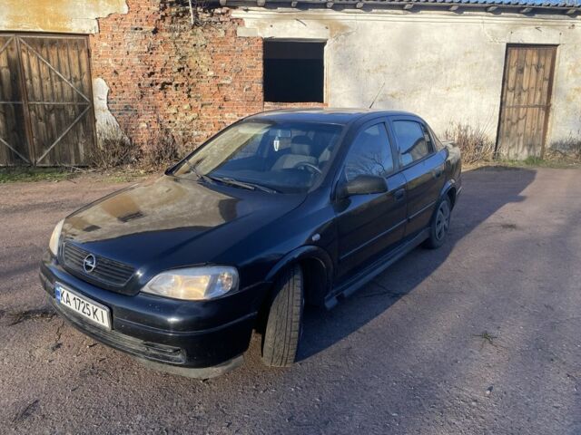 Черный Опель Астра, объемом двигателя 1.4 л и пробегом 219 тыс. км за 3400 $, фото 1 на Automoto.ua